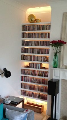 a living room filled with lots of books