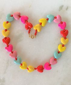 Multicolor Heart Beads Round Jewelry, Multicolor Heart Shaped Beads Jewelry, Valentine's Day Playful Beaded Jewelry, Playful Round Beads Jewelry For Valentine's Day, Playful Valentine's Day Jewelry With Round Beads, Valentine's Day Jewelry With Heart-shaped Beads, Valentine's Day Jewelry With Heart Beads, Adjustable Colorful Beads Necklace For Valentine's Day, Multicolor Beaded Heart Pendant Necklace