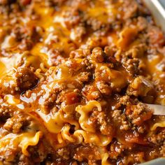 a casserole dish with ground beef and cheese