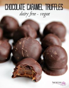 chocolate caramel truffles on a white plate with text overlay that reads, chocolate caramel truffles dairy - free vegan