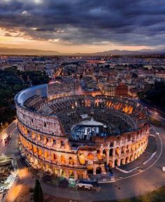 an aerial view of the roman colossion in rome, italy at night time