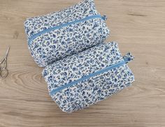 Blue Bags With Zipper Pouch For Storage, Blue Rectangular Pouch For Daily Use, Rectangular Blue Pouch For Daily Use, Rectangular Blue Cosmetic Bag, Blue Everyday Pouch Box Bag, Everyday Blue Pouch Box Bag, Blue Pouch Box Bag As Gift, Blue Pouch Box Bag, Blue Square Bag For Gifts