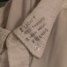 a white shirt with writing on it that says i don't need therapy, i need me to pretend friends