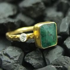 "ARTSMYRNA METAL: 925k Silver GEM: Emerald ( lab created ) Diameter Stone Size: 12x12 mm COATING: 24k gold over (We can made a special type of coating for your personal preference ) MATERIEL : 925K Sterling Silver ( Some of my items vermeil gold over silver for looks rich . But i can finish in silver too ) RING SIZE: 6 (your desired size is made) Features It is the divine gem of Goddess Venus. It is also known as \"Healer Stone\". It has the ability to maintain emotional, physical and spiritual Ancient Roman Jewelry, Initial Necklace Silver, Roman Jewelry, Smaragd Ring, River Edge, Mother Jewelry, Silver Signet Ring, Ancient Jewelry, Aquamarine Rings