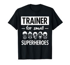 a black shirt that says trainer for small superheros