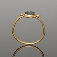 BEAUTIFUL ANCIENT ROMAN GOLD RING -WITH GREEN STONE 2nd Century AD (8876) | eBay Ancient Silver Jewelry, Sun Outfits, Ancient Gold Ring, Storm Comic, Black Nativity, Ancient Rings, Lost Wax Jewelry, Etruscan Jewelry, Ottoman Jewelry