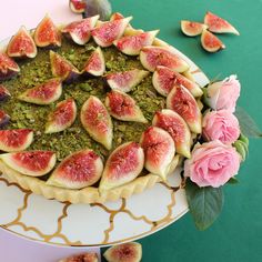 there is a cake with figs on it