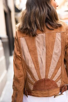 Woman wearing tan leather jacket with neutral sun design on the back Leather Jacket Zipper, Tan Leather Jackets, Stunning Sunset, Sunset Design, Blazer Jackets For Women, Leather Company, Western Design, Jacket Sale, Beautiful Sunset