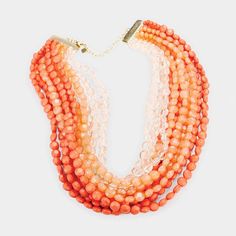 Faceted Coral Round Lucite Beaded Necklace Set by V Foxy CollectionItem: Necklace & EarringsBrand: V Foxy CollectionColor: Coral, OrangeNecklace Length: 20" + 3" ExtensionDecor Size: 3" (inches)Earring Length: 1.5" (inches)Fastening: Lobster Clasp Metal: Gold Tone AlloyMaterials: Beads, LuciteTheme: Bridal, Prom, Pageant, Evening All Measurements are Approximate Sold As One Individual Necklace & 1 Pair of Matching Earrings Beaded Bib Necklace, Bib Necklace, Multi Strand, Bright Orange, Matching Earrings, Necklace Set, Lobster Clasp, Gold Tones, Beaded Necklace