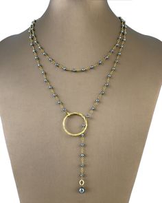 The Christina lariat necklace offers delicate beads strung on metal chain, a metallic circle to loop through, and multiple styling options. Part of our Statement Jewelry assortment. Beaded chain necklace with metal circle loop. Avoid water, soap, and harsh chemicals. Store in a box or bag in a cool, dry place. Clean using a dry soft cloth. Hands Free Bag, Tennis Jewelry, Stackable Jewelry, Italian Leather Bags, Rosary Necklace, Italian Outfits, Bead Stringing, Lariat Necklace, Drop Pendant