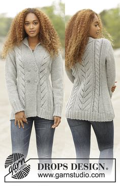 two women standing next to each other wearing sweaters