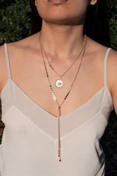 "\" JLO \" Spice up any outfit by throwing on this long Y lariat. This gorgeous chain pairs beautifully with a monochromatic outfit or a low v cut shirt. L E T S . T A L K . N E C K L A C E S ✤ Available in 14k Gold Filled or Sterling Silver ✤ Model is wearing size 36\" ✤ A bead is added where the \"Y\" meets as an adjustable slider stopper. (The bead is movable up down for a versatile look!) ✤ Available sizes 28\" 32\" 36\" All purchased items will arrive in a Tommassini Jewelry box. If you pur Delicate Chain Lariat Layered Necklace, Bohemian Lariat Necklace With Delicate Chain Dangle, Bohemian Lariat Necklace With Delicate Dangle Chain, Bohemian Lariat Necklace With Delicate Chain, Bohemian Layered Lariat Necklace With Adjustable Chain, Bohemian Delicate Chain Lariat Necklace, Adjustable Lariat Layered Necklace, Bohemian Lariat Layered Necklace As Gift, Bohemian Lariat Layered Necklace Gift