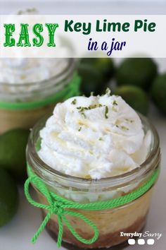 two jars filled with whipped cream and limes