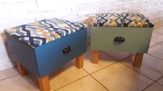 two stools made out of drawers on the floor