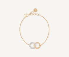 This refined bracelet symbolises an unbreakable bond, with a diamond-studded white gold link locking into one in 18K yellow gold, finely hand-engraved using an ancient Florentine technique. An adjustable, versatile chain ensures the perfect fit around every wrist.