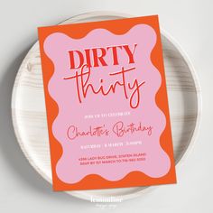 an orange and pink birthday party card on a plate with the words dirty thingy