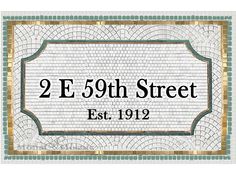 the sign for 29th street is shown in gold and white bricks with a green border