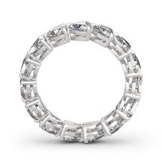 a white gold diamond ring on a white background