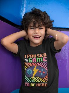 I Paused My Game To Be Here Sweatshirt, Funny Shirt, Gamer Gift, Funny Gaming Shirt, Gaming T-Shirt, Funny Gaming T-shirt, Gaming Present Level up your wardrobe with our "I Paused My Game To Be Here Sweatshirt." This funny gaming shirt is the perfect gift for gamers who appreciate a good laugh and know how to prioritize their passions.  🛍️ HOW TO ORDER 🛍️ 1. Browse our photos to find your favorite design. 📷 2. Choose your T-Shirt style, size, and color from our easy menus. ✨ 3. Add a personal touch with your choice of design print color during checkout. 🎨 4. Click 'Add to Cart' and follow the prompts--it's that easy! 🛒 🚚📦 SHIPPING & PRODUCTION 🚚📦 Order Processing: 1-2 days Shipping: Nationwide delivery in 2-5 days Satisfaction guaranteed! 💚 ✨ CARE INSTRUCTIONS ✨ Wash inside out w Screen Print Short Sleeve T-shirt For Playtime, Funny Cotton T-shirt For Playtime, Playtime Cotton Shirt With Graphic Print, Crew Neck Tops With Screen Print For Playtime, Cotton Graphic Print Shirt For Playtime, Cotton Shirt With Graphic Print For Playtime, Funny Crew Neck T-shirt For Playtime, Funny Short Sleeve Tops For Playtime, Graphic Print Crew Neck Shirt For Playtime