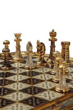 a golden chess board with pieces on it