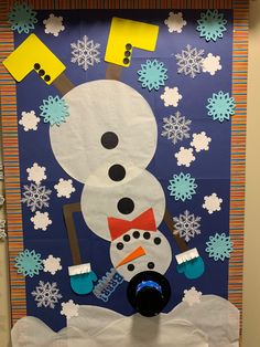 a bulletin board with a snowman on it