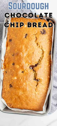 a loaf of chocolate chip bread in a pan with the words sourdough chocolate chip bread