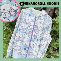 Kawaii Sanrio Cinnamoroll Hoodie - Kawaii Zip Up Sweatshirt Sanrio V Kawaii Blue Sanrio Hoodie W Cinnamoroll Dog. Hoodie Jacket W Repeating Print Of Iconic Sanrio Character Cinnamoroll. Hoodie Has A Relaxed Fit. Purple Zipper. This Htf Cinna Hoodie Is Part Of The Sanrio Smiles Collection. Nwt! Size Is Asian M-L - So Approx A Larger M In Us Sizes. Comment For Exact Measurements Imported From Japan. Import Proofs Available. Offers Welcome!!! #Sanrio #Cinnamoroll #Cinna #Kawaii #Hoodie Cinnamon Roll Hello Kitty Hoodie, White Kawaii Hoodie Outerwear, White Hooded Kawaii Top, White Kawaii Hoodie With Cartoon Print, White Kawaii Hoodie Top, White Kawaii Sweatshirt With Drawstring Hood, Kawaii Blue Cotton Hoodie, Blue Cotton Kawaii Hoodie, Cute Blue Tops With Drawstring Hood