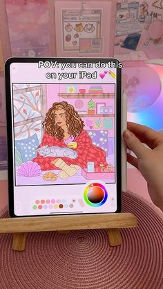 a person holding up an ipad with a drawing on the screen and text reading, rowan you can draw this on your ipad