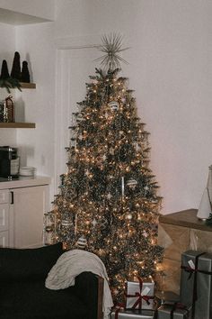 a decorated christmas tree in a living room