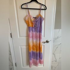 Midi Tie Dye Printed Dress With Cutout Detail At Chest, Zipper Closure On Side And Adjustable Straps Purple Summer Sundress For Parties, Purple Maxi Length Sundress For Vacation, Casual Purple Maxi Dress For Day Out, Purple Maxi-length Summer Sundress, Purple Maxi Sundress For Summer, Purple Maxi Length Summer Sundress, Summer Purple Maxi Sundress, Casual Purple Sundress For Day Out, Purple V-neck Sundress