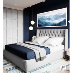 a bedroom with blue walls, white bedding and an art piece on the wall