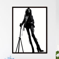 A Poster of girl model shooting low angle shot - A Woman In Leather Clothes And A Black Hat Default Title Low Angle Shot, Leather Clothes, Low Angle, Black Hat, Leather Outfit, Vibrant Prints, A Black, Art Images, Modern Art