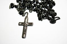 Antique rosary with a pewter crucifix and black beads. In good condition, with minor wear commensurate to age. Black Spiritual Rosary Bracelet With Cross, Silver Rosary With Black Beads And Crucifix, Antique Rosary, Plastic Jewelry, Scottsdale Az, Antique Metal, Eye Necklace, Black Beads, Pure Silver