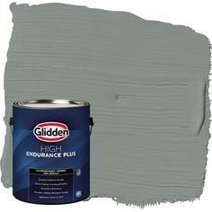 a gray paint with the words glidden high performance plus on it and an open can