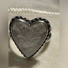 James Avery Sculpted Heart And Tulips White Doublet Sterling Silver Ring, Size 9 Retired Used A Few Times. In Excellent Condition Comes With Dustbag & Box Gift-Able Item Description Item #20158644 From James Avery, This Ring Features: Wear A Bold And Timeless Expression Of Love With This Sterling Silver James Avery Ring Set With A Heart-Shaped Doublet Gemstone. Reminiscent Of Florals Found In Folk Art, Two Tulip Flowers Are Sculpted Onto This Layered, White Stone. * Sterling Silver * White Doubl James Avery Rings, James Avery Jewelry, James Avery, Blue Bonnets, Box Gift, White Stone, Womens Jewelry Rings, Clear Quartz, Ring Set