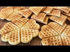 several waffles are arranged on a cooling rack