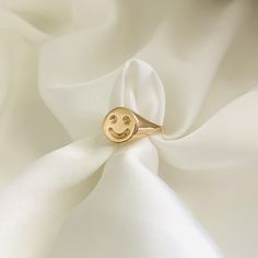 ⭐️Item Details:  Emoji Face Width: 11mm Band Width: 2mm Material: 18k Gold Filled Benefits: Water & Tarnish Resistant, Hypoallergenic  ⭐️Care Instructions:  1. You may shower and sleep with your gold filled items but it is highly suggested to avoid direct contact with pools, hot tubs, and saltwater.  2. Avoid the jewelry to come into contact with perfume, lotions or any other cosmetic products.   3. Rinse jewelry in warm water at least once a week and gently dry it with a soft cotton cloth to en Emoji Ring, Baguette Eternity Ring, Smiley Face Ring, Dainty Gold Ring, Emoji Face, Face Ring, Dainty Gold Rings, Friendship Rings, Emoji Faces