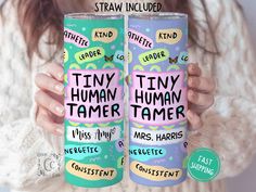 two tumbles with the words tiny, tiny human tamer written on each one