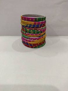 Welcome to our shop We bring to you very ethnic products from core of India almost every thing is handmade or custom made Set of 22 Bangles in multiple colors Size 2.4 We will be happy to serve you Traditional Multicolor Bracelets For Puja, Traditional Multicolor Bracelet For Puja, Pink Handmade Traditional Bangle, Traditional Adjustable Multicolor Bangle, Handmade Pink Bracelets For Festive Occasions, Handmade Pink Bracelets For Festive Season, Handmade Pink Festive Bracelets, Handmade Multicolor Bracelets For Festive Occasions, Multicolor Stackable Jewelry For Festival