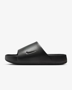 This is a NEW, never-worn, pair of Nike CALM SLIDE sandals in the "BLACK" or "Noir" colorway in Men's Size 6. These are Nike model FD4116-001 and they are amazing! Here is additional information on this incredible footwear: When it comes to these slides, it's all in the name. Take a deep breath and slip into a minimalist look with maximalist cushioning. Contoured foam is seamlessly created from one piece, and cradles your feet to help keep them in place. To top it off, the water-friendly design Black Modern Slip-on Slides, Slip-resistant Sandals For Streetwear, Black Slip-resistant Sandals With Round Toe, Nike Slide Sandals With Rubber Sole, Nike Open Toe Slides With Textured Footbed, Nike Slides With Rubber Sole, Nike Open Toe Slides With Rubber Sole, Nike Open Toe Sandals With Textured Footbed, Black Non-slip Flat Sport Sandals