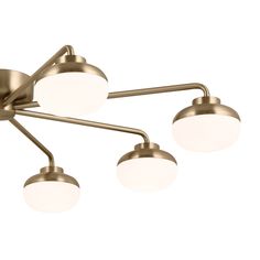 three lights that are on top of a ceiling fixture with white glass balls in the middle