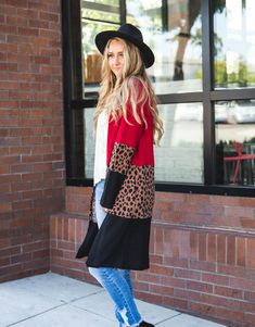 We're taking animal print to the next level with a pop of color! Our Briana cardigan is the best way to dress up old jeans and your everyday basics! Its super soft material and color block style will easily complete your look in a snap. Size Small 0-4 Medium 6-8 Large 10-12 XL 12-14 Models are 5'4" & 5'5" are wearing small. Leopard Print Cardigan For Fall Layering, Fall Leopard Print Cardigan For Layering, Leopard Print Layering Outerwear For Fall, Trendy Spring Leopard Print Cardigan, Trendy Leopard Print Spring Cardigan, Trendy Leopard Print Cardigan For Fall, Trendy Leopard Print Winter Cardigan, Casual Leopard Print Outerwear For Layering, Chic Patchwork Cardigan For Fall