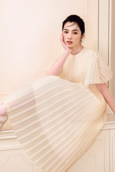 Elegant Beige Pleated Dress, Feminine Cream Chiffon Dress, Cream Pleated Evening Dress, Elegant Cream Dress With Pleated Waist, Elegant Short Sleeve Dresses With Accordion Pleats, Elegant Beige Pleated Dress For Spring, Feminine Pleated Wedding Dress, Chic Cream Dresses With Pleated Bodice, Feminine Dresses With Accordion Pleats