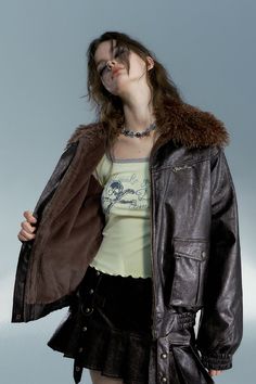 Step up your fashion game with our Velvet Leather Coat. This jacket is designed with a plush velvet collar and made from high-quality synthetic leather. The washed leather finish adds a vintage touch. High-quality synthetic leather Removable plush collar Plush collar available in pink or brown velvet Loose fit for comfort and ease of movement Easy-to-use zipper for quick wear Washed leather for a vintage look 45% PU Leather55% ViscoseBrand: Strike A PoseThis item is a creation of Strike A Pose, Loose Leather Jacket, Collar Leather Jacket, Velvet Collar, Y2k Clothing, Fashion Gallery, Strike A Pose, Winter Wear, Leather Coat, Jacket Outfits