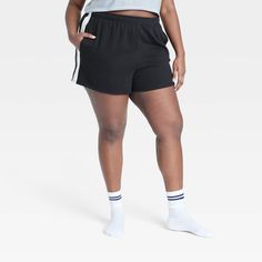 Elevate your casual wardrobe with this High-Rise Lounge Shorts from Colsie™. Tailored in a casual fit, the high-rise shorts are made from a midweight stretchy fabric offers a flexible fit that moves with you. It's fashioned with a drawstring closure elastic waistband for a snug fit and side pockets to add touches of classic style. Pair these lounge shorts with your choice of tops for a number of stylish ensembles. Colsie™: All You, Inside and Out. Casual Black High Waist Athletic Shorts, Casual Workout Bottoms Mid-thigh Length, Casual Mid-thigh Length Shorts With Built-in Liner, Casual Sports Bottoms Mid-thigh Length, Casual Mid-thigh Length Athletic Shorts For Loungewear, Casual Mid-thigh Length Shorts For Loungewear, Casual Mid-thigh Loungewear Shorts, Casual Mid-thigh Athletic Shorts For Summer, Casual Mid-thigh Length Athletic Shorts For Summer