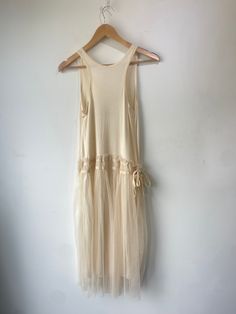 Vintage Drop Waist Ballerina Dress. Super soft and stretchy on top with pleated tulle over a shiny layer on bottom. Two ties on the side can be left open or tied into a bow. The whole dress is a bit sheer making it super sexy. Approximate measurements:Underarm to underarm: 15" Length: 44" White Drop Waist Dress, Drop Waist 50s Dress, Drop Waist Dress Mini, 20s Drop Waist Dress, 80s Drop Waist Dress, Crystal Dress, Ballerina Dress, Dropwaist Dress, Drop Waist