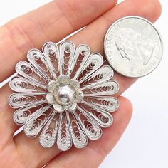 925 Sterling Silver Vintage Filigree Floral Design Pin Brooch Weight: 8.0g WELCOME TO PAWN SHOP We are an actual pawn shop and have been in business for over 25 years. Since 1990, our establishment has been serving a variety of clients by providing them with short term cash solutions and options of liquidity regarding their treasured heirlooms. Acknowledging that today′s customers are very sophisticated and are looking for a variety of investments, our acquisitions are hand-picked for our specia Traditional Silver Brooches For Anniversary, Classic Filigree Brooches As Gifts, Classic Silver Brooches With Intricate Design, Silver Filigree Brooch For Anniversary, Silver Filigree Brooch In Sterling Silver, Silver Filigree Oval Brooches, Silver Sterling Silver Filigree Brooch, Silver Filigree Sterling Silver Brooch, Classic Silver Filigree Brooches