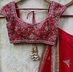 A three-piece red bridal lehenga set from the Priti Sahni collection. This gorgeous raw silk red lehenga with pearl, sequin, zardozi butti work detail is paired with raw silk blouse with sequin, pearl zardozi embroidery. This outfit is completed with an ombre dyed tulle dupatta in raw silk material with kundan butti work. Ombre Dupatta, Silk Bridal Lehenga, Pink Bridal Lehenga, Raw Silk Blouse, Raw Silk Lehenga, Zardozi Work, Pearl Work, Zardozi Embroidery, Bridal Lehenga Red