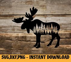 an image of a moose with trees cut out of it's antlers on a wooden background