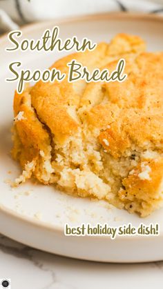 a close up of a piece of bread on a plate with the text southern spoon bread best holiday side dish